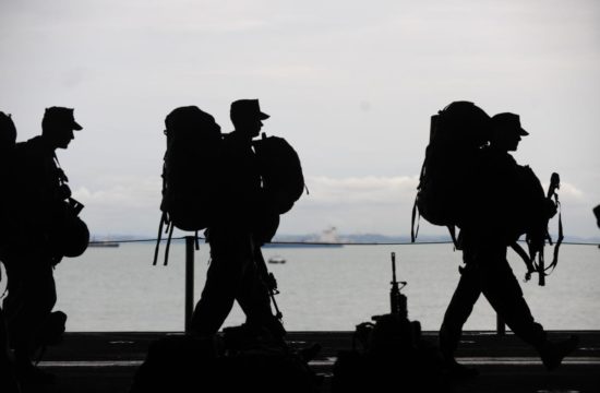 Line of Soldiers Walking Drug War Military